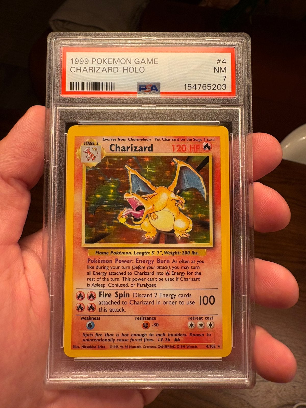 Charizard base set (BS 4) PSA 7, Hobby en Vrije tijd, Verzamelkaartspellen | Pokémon, Ophalen of Verzenden, Nieuw