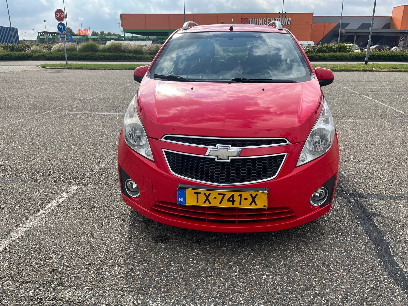 Chevrolet Spark 1.2 2010 Rood, Auto's, Chevrolet, Voorwielaandrijving, Stof, 4 cilinders, Grijs