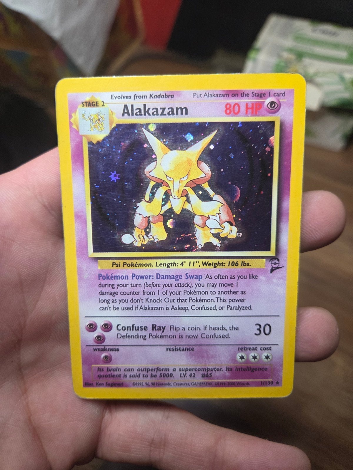 Alakazam Holo 1/130 Base Set 2 Wotc era 2000, Ophalen of Verzenden, Zo goed als nieuw, Losse kaart, Foil