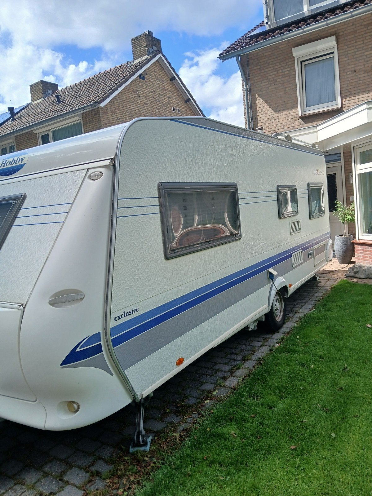 Hobby Exclusief 560 - Ruime en complete caravan, Caravans en Kamperen, Rondzit, Hobby, Particulier, Luifel