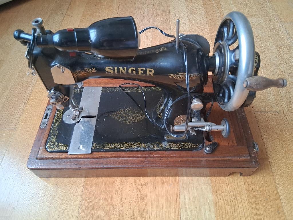 Antieke naaimachine Singer: 128 klasse, Ophalen