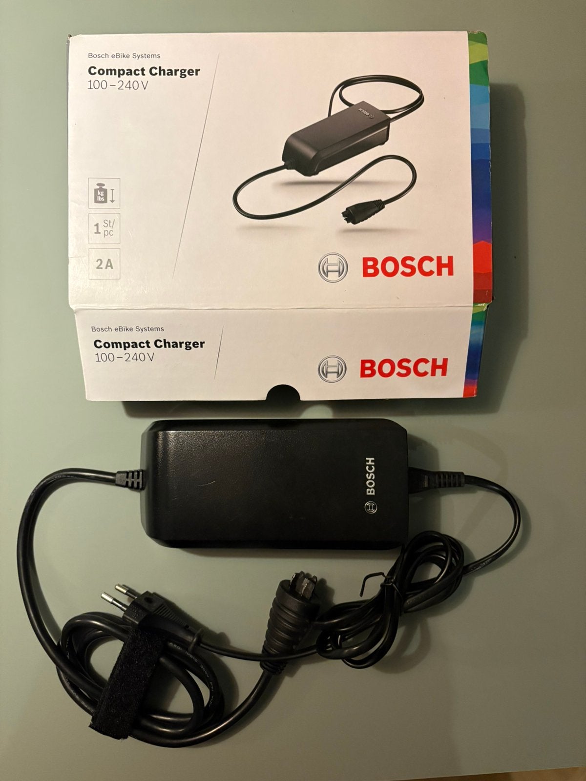 Bosch compact charger e-bike oplader - acculader, Fietsen en Brommers, Fietsaccessoires | Fietsaccu's, Ophalen of Verzenden, Zo goed als nieuw