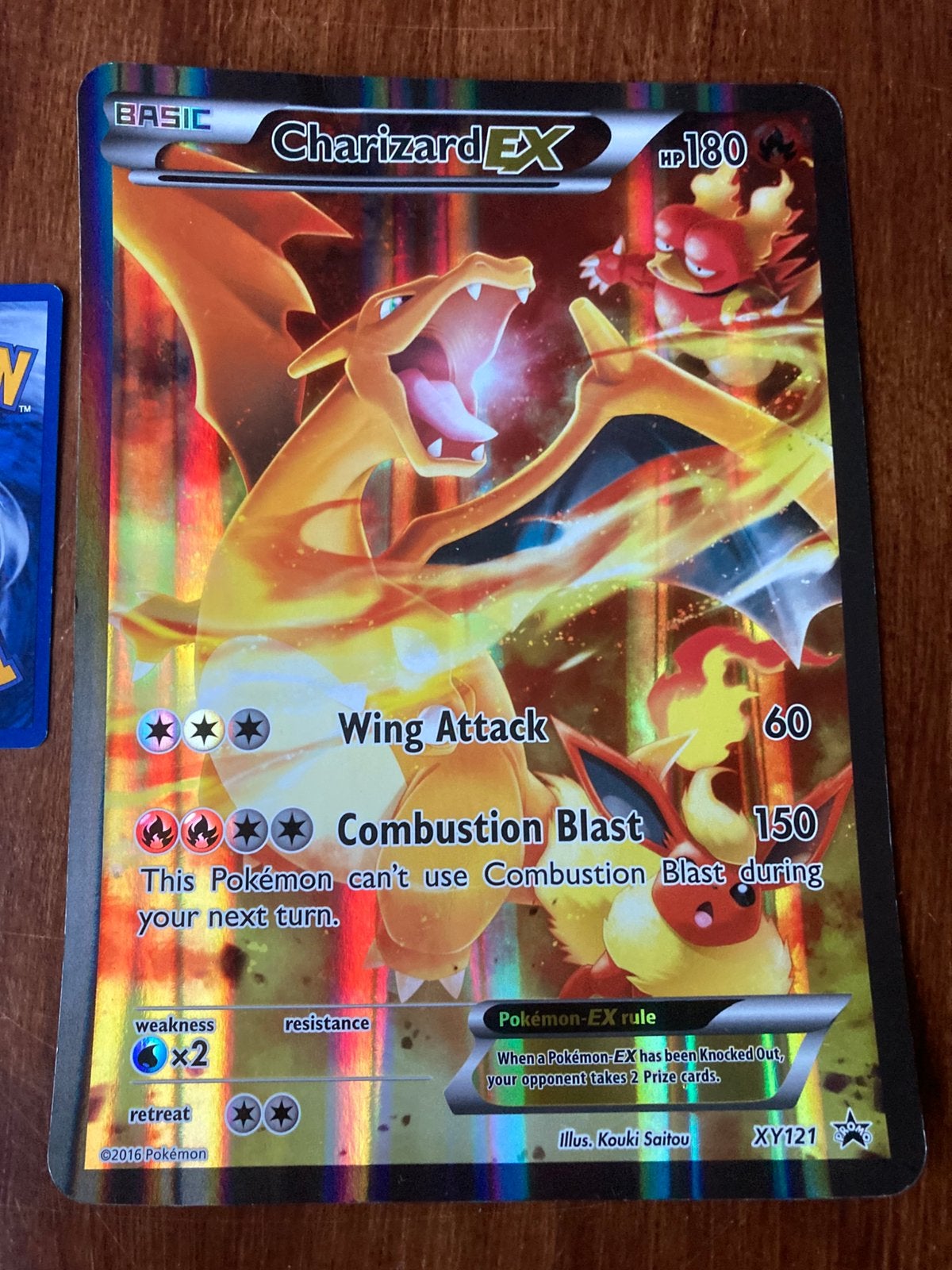 Charizard EX XY121 Pokémon Jumbo kaart, Ophalen of Verzenden, Zo goed als nieuw, Losse kaart