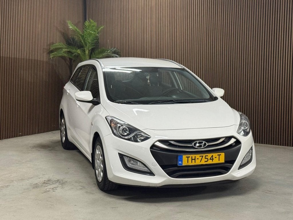 Hyundai i30 Wagon 1.4 Garantie, nieuw ketting (bj 2014), Auto's, Voorwielaandrijving, Euro 5, Gebruikt, 4 cilinders