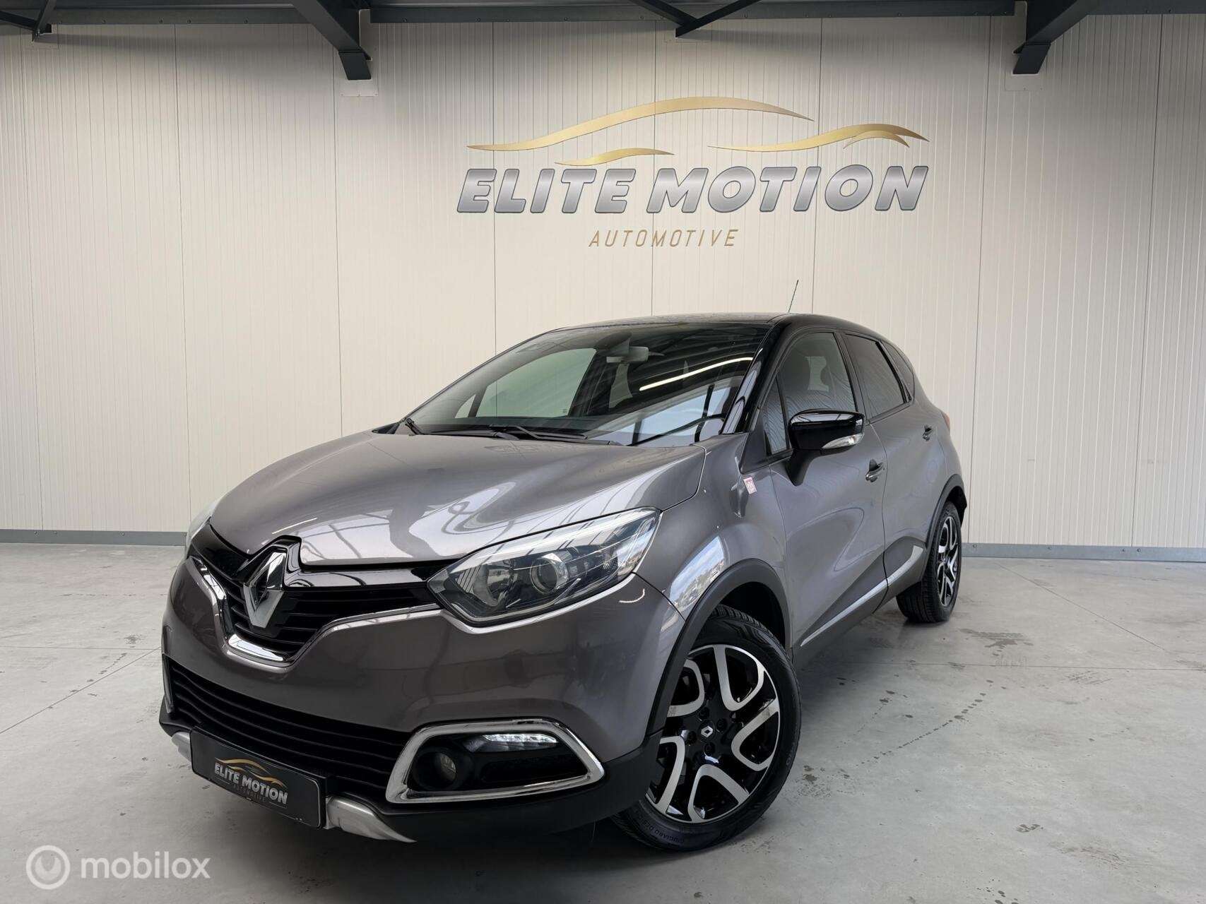 Renault Captur 1.2 TCe Helly Hansen | ECC | Keyless |, Auto's, 4 cilinders, Leder en Stof, 19 km/l, Verwarmde buitenspiegels