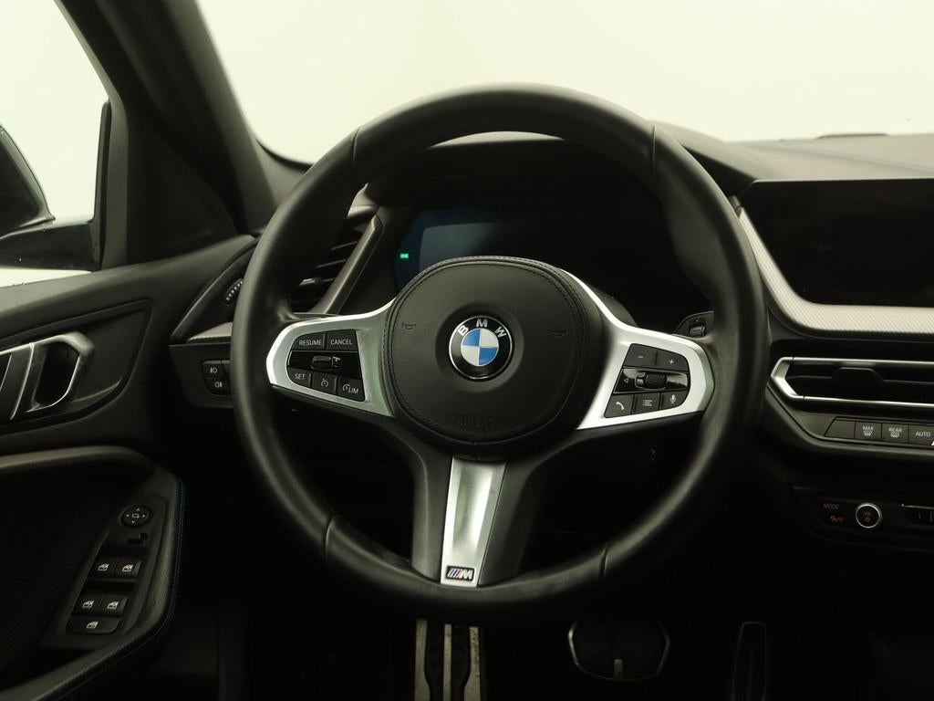 BMW 1 Serie 118i Executive Edition M Sport (bj 2021), Auto's, BMW, 136 pk, Gebruikt, Met garantie (alle), Leder en Stof