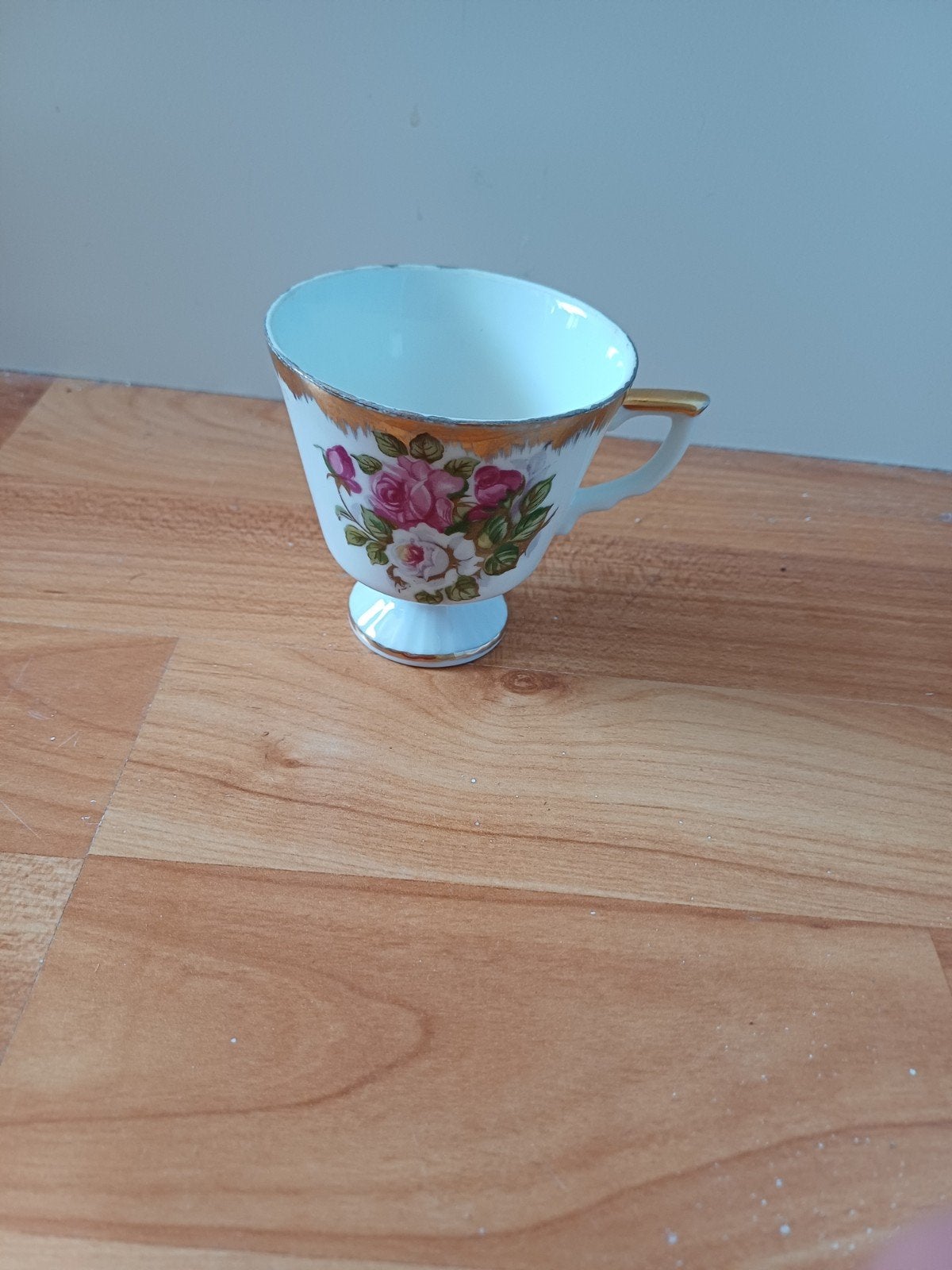 Vintage porseleinen theekopje met bloemmotief, Ophalen of Verzenden