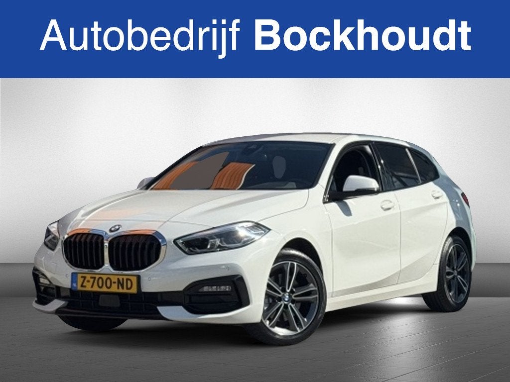 BMW 1-serie 118i High Exec (bj 2022, automaat), Auto's, 136 pk, Gebruikt, Automatische klimaatregeling, Wit