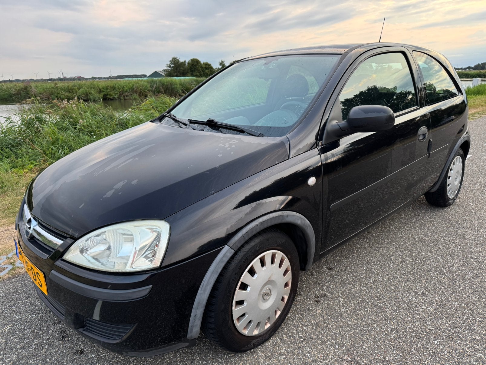 Nette Opel 1.2-16v Twinport Rhythm (2005) – 1e eigenaar!!, Stof, 4 cilinders, 1229 cc, Zwart