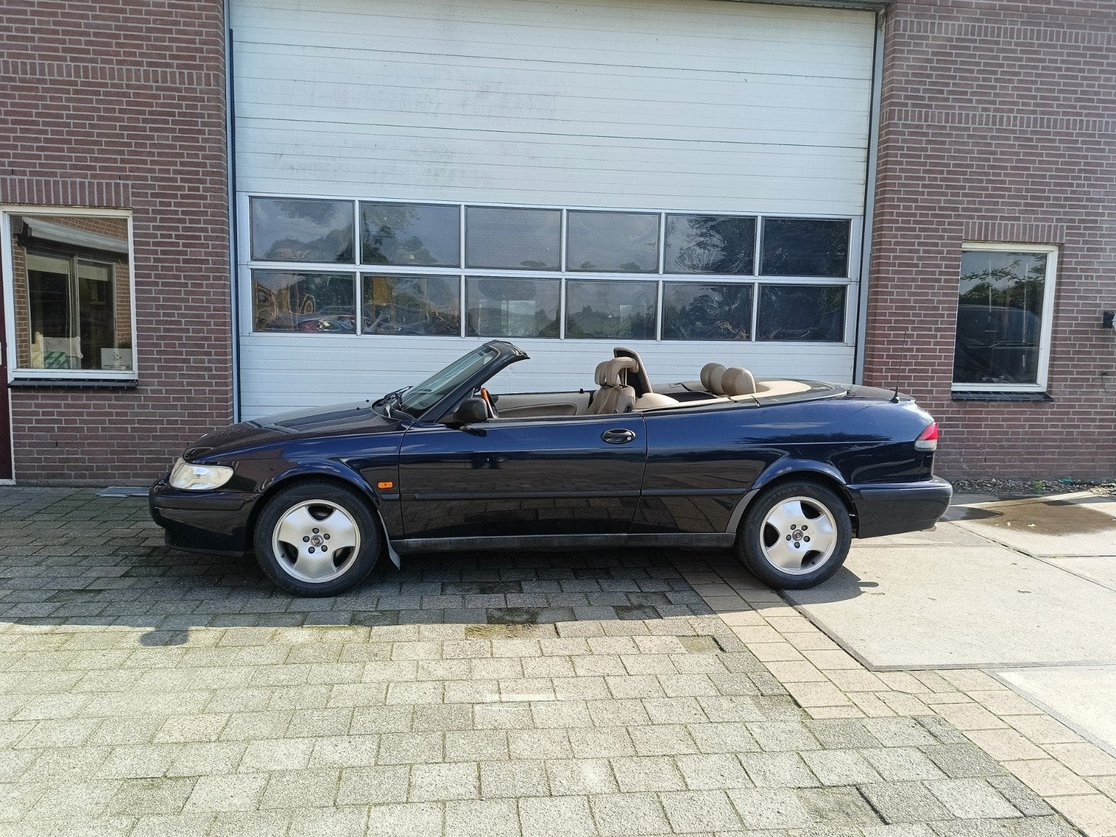 Saab 9-3 2.0 T Cabrio AUT 1999 Blauw, Auto's, 4 cilinders, Cabriolet, Origineel Nederlands, Particulier