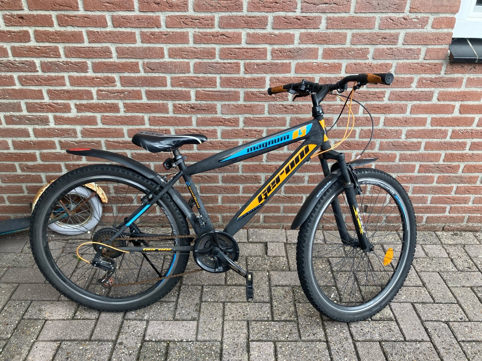 Geroni Magnum 6 Mountainbike - Zwart/Geel/Blauw, Gebruikt, Velgrem, Meer dan 20 versnellingen, Ophalen