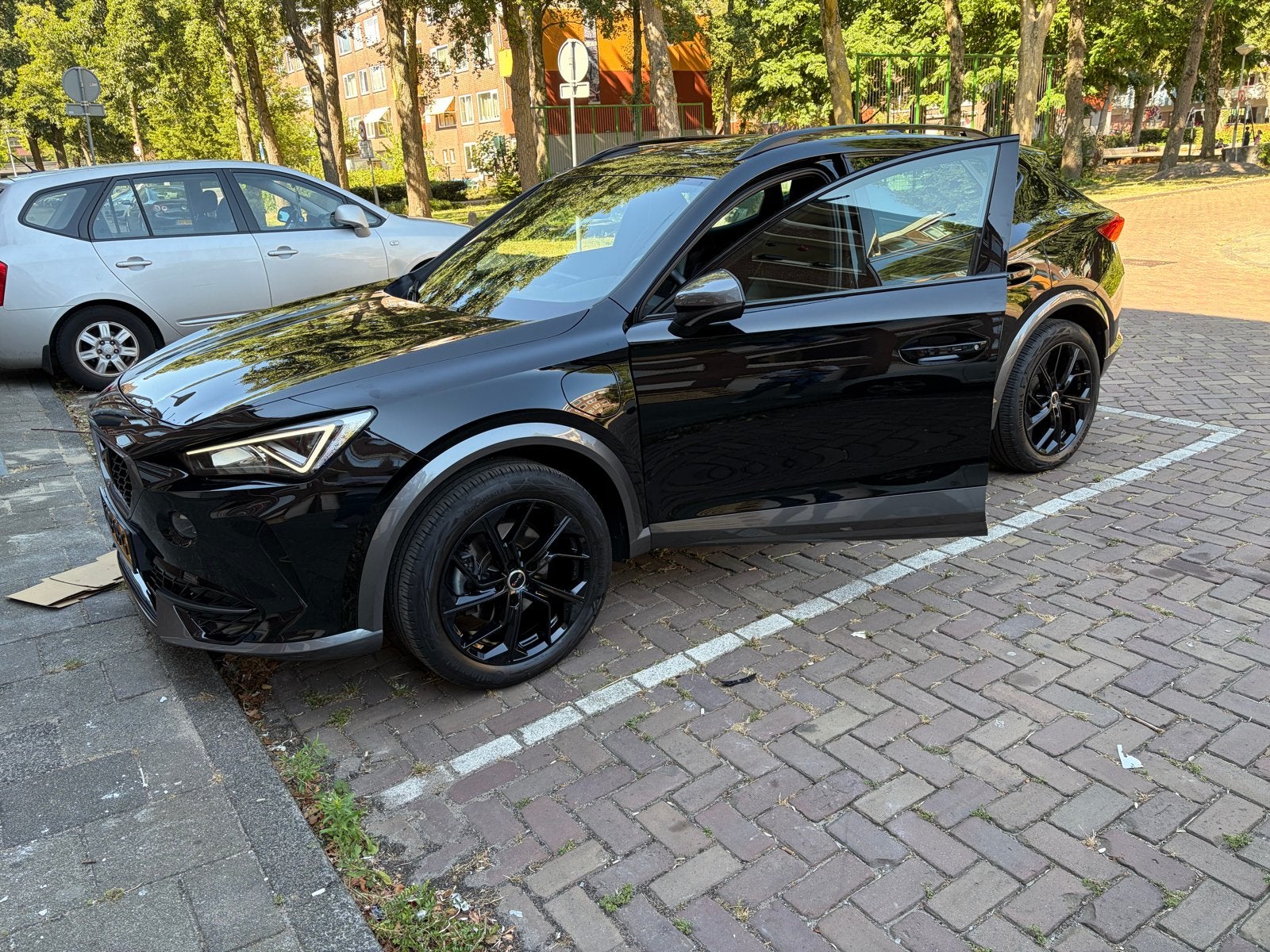 Cupra Formentor 1.4 e-Hybrid VZ, Auto's, Cupra, Zwart, 4 cilinders, Zwart, Leder