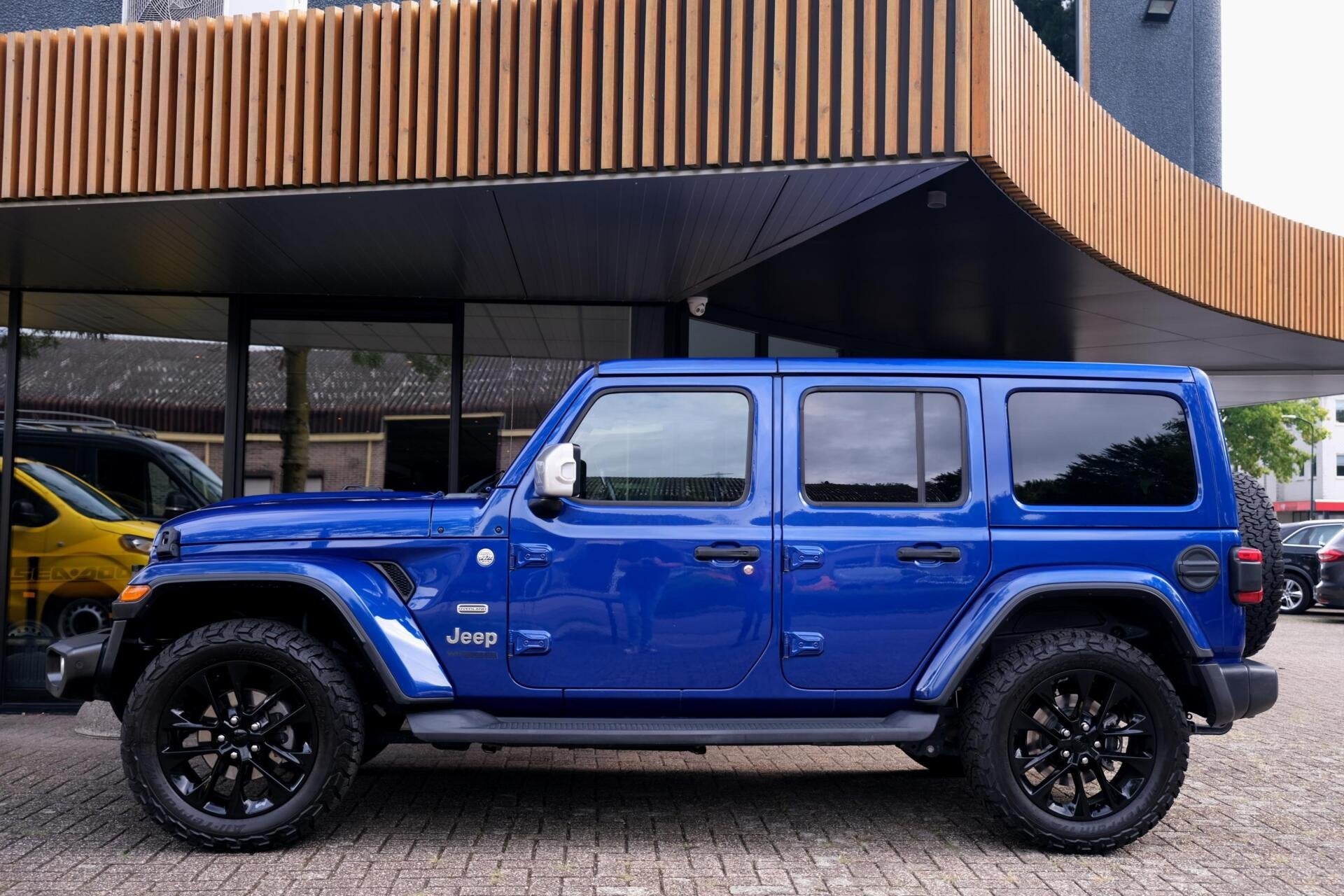 Jeep Wrangler Unlimited 2.0T Sahara|Rijklaar!|Overland|ACC|C, Auto's, Automaat, Cabriolet, Blauw, Leder