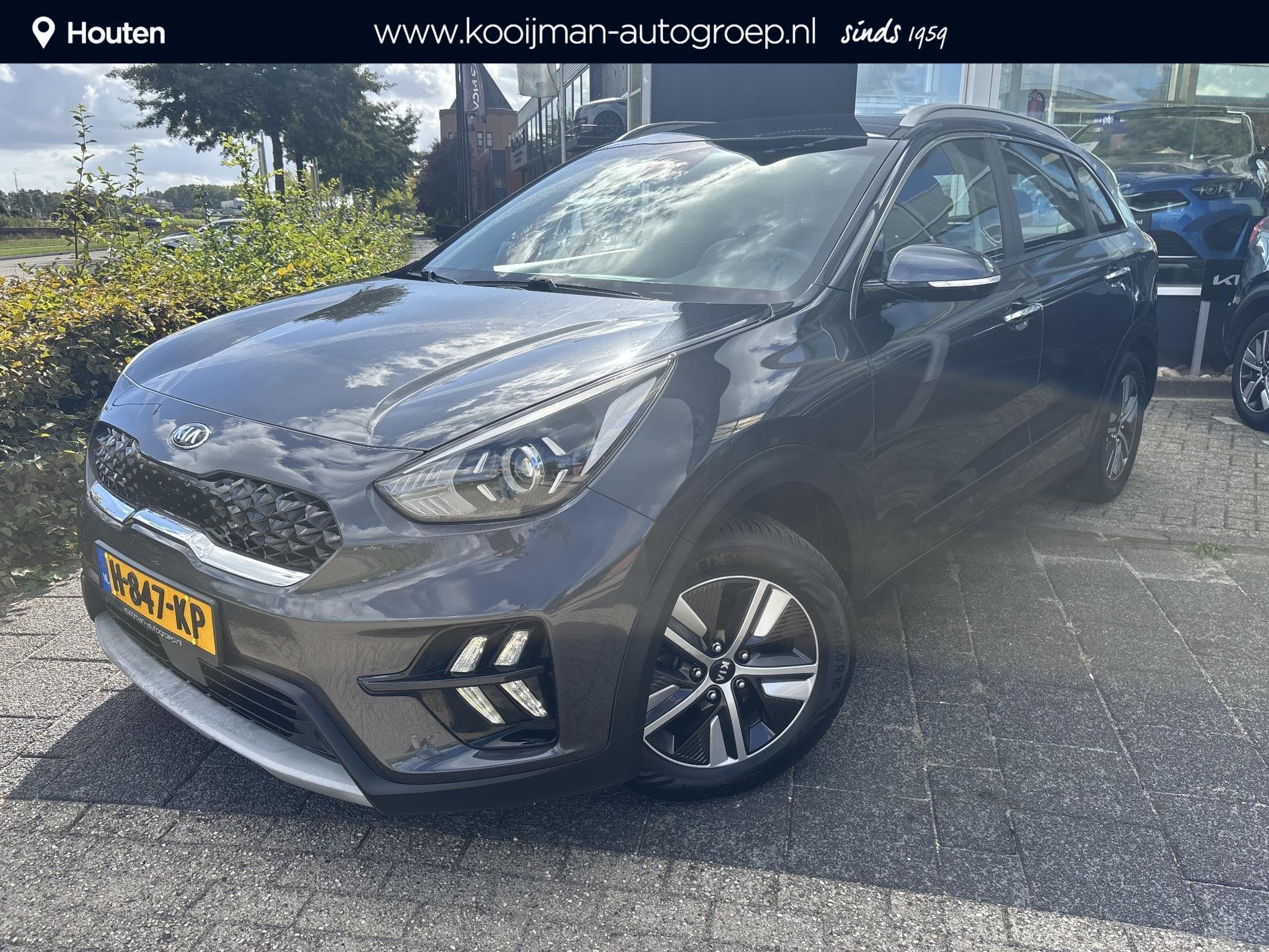 Kia Niro 1.6 GDi Hybrid DynamicLine Trekhaak, All weather ba, Auto's, Gebruikt, Euro 6, 2 kWh, Leder en Stof