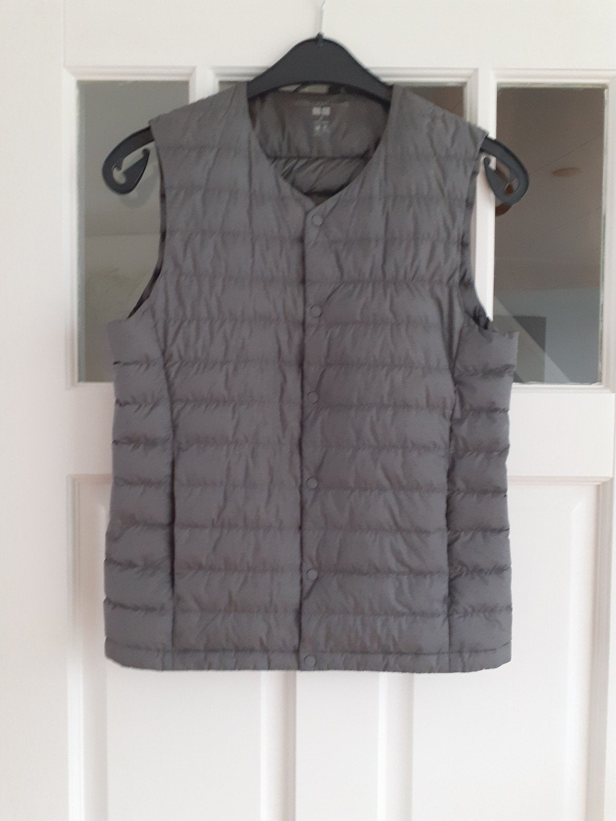 UNIQLO grijze dons bodywarmer ulta light down maat XS, Ophalen of Verzenden, Zo goed als nieuw, Maat 34 (XS) of kleiner, Grijs