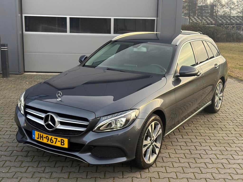 Mercedes-Benz C-Klasse C300 h 231pk 7G-TRONIC 2016 Grijs, Auto's, Automaat, Achterwielaandrijving, Origineel Nederlands, 26 km/l
