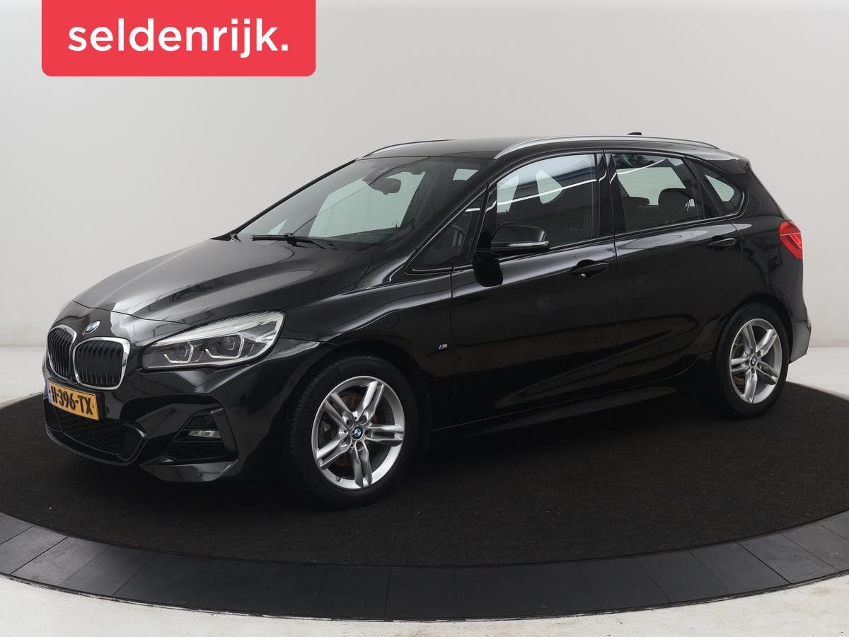 BMW 2-serie Active Tourer 218i M Sport Executive | Half lede, Auto's, Gebruikt, Euro 6, Leder en Stof, Zwart