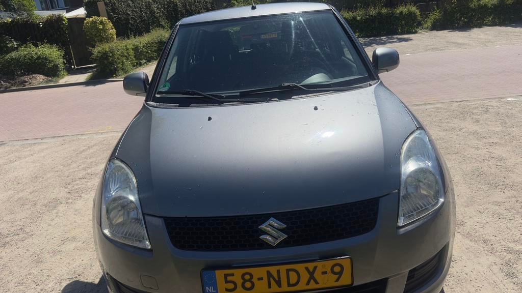Suzuki Swift 1.3 5D 2010 Grijs, Auto's, Voorwielaandrijving, 40 €/maand, 400 kg, Swift
