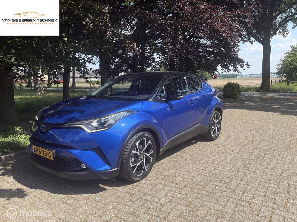 Toyota C-HR 1.8 Hybrid Executive leer, navi All in rijklaar, Auto's, 4 cilinders, Blauw, 122 pk, Leder