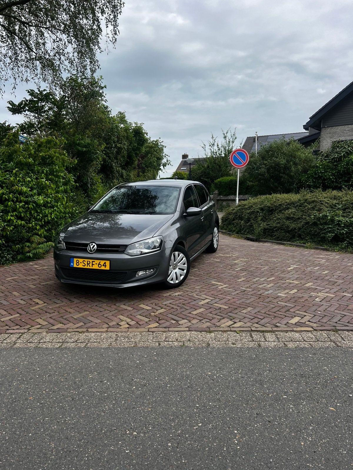 Volkswagen Polo 1.6 TDI 66KW 2014 Grijs 2e eigenaar, Voorwielaandrijving, Stof, Origineel Nederlands, 1200 kg