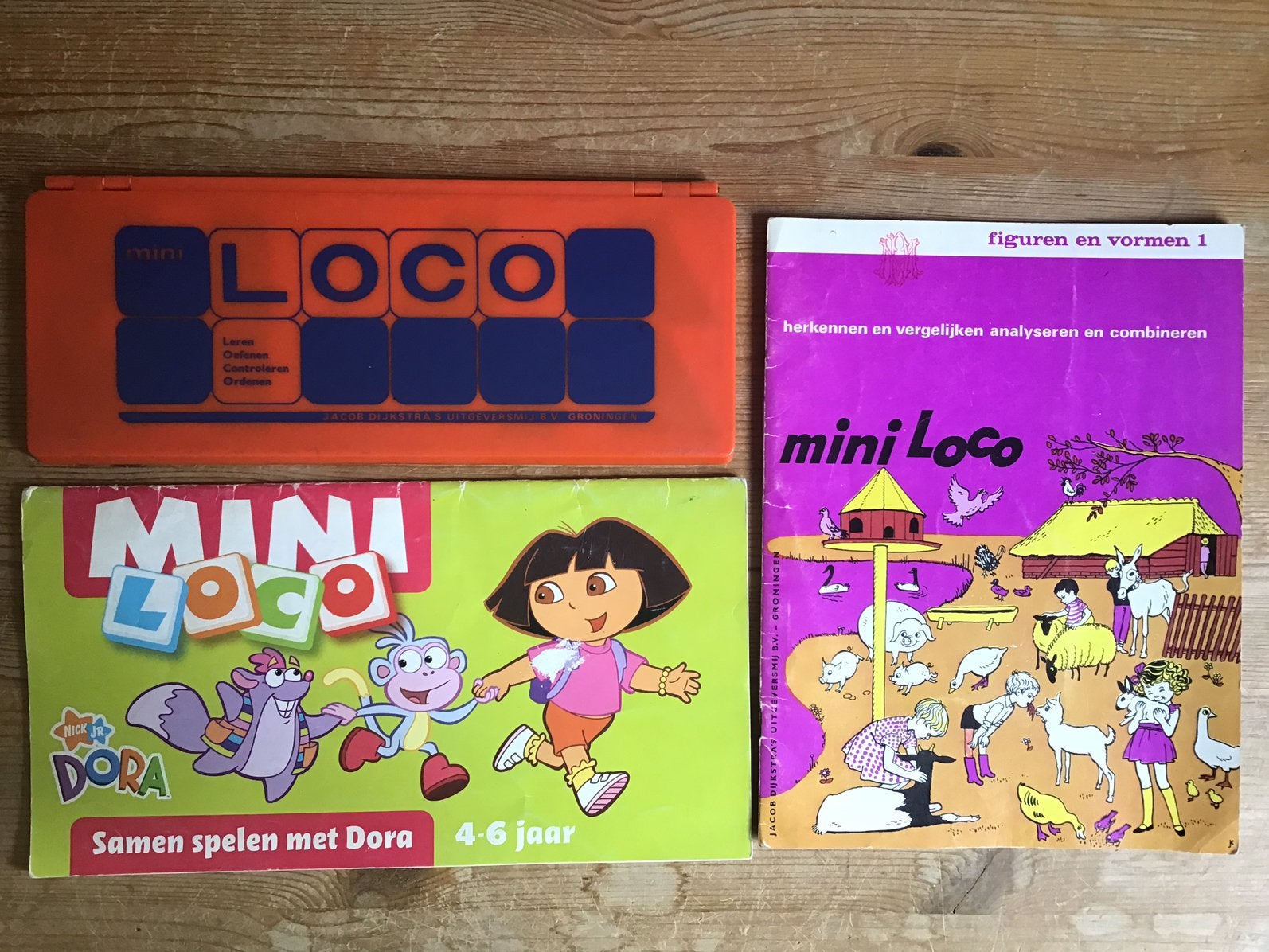 Miniloco met boekje dora + boekje figuren en vormen 1 ., Ophalen of Verzenden, Zo goed als nieuw