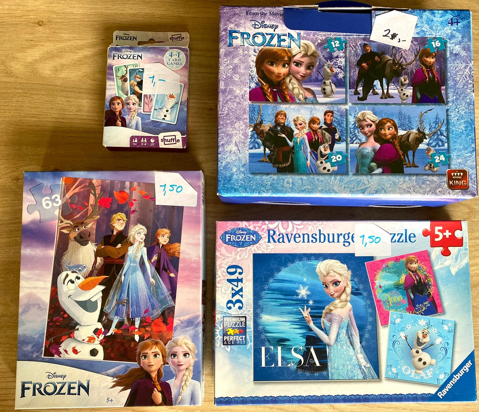 Drie Elsa Frozen puzzeldozen(8 puzzels) en 4 in 1 card games, Ophalen of Verzenden, 10 tot 50 stukjes, Zo goed als nieuw