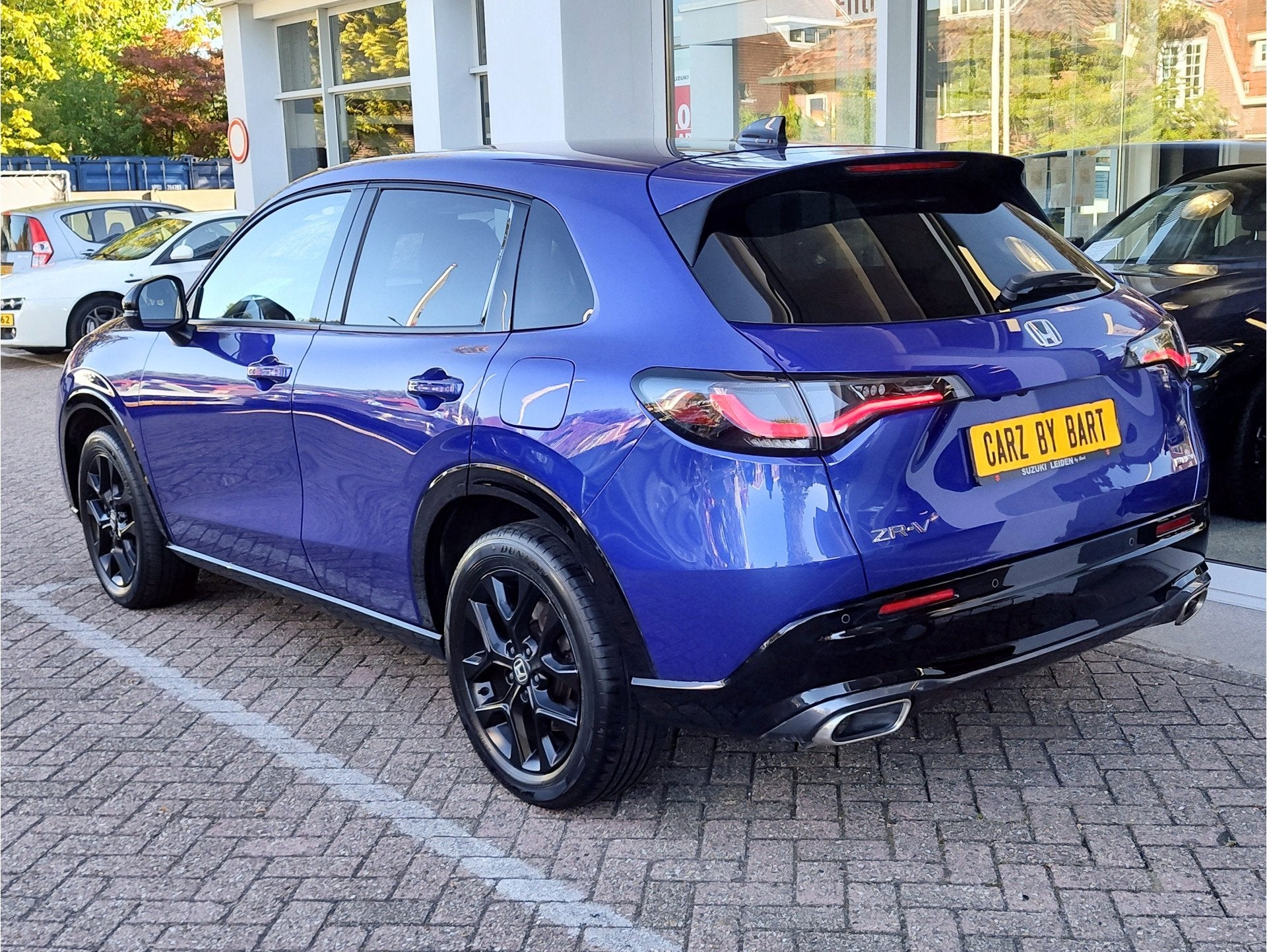 Honda Zr-V 2.0 e:HEV SPORT AUTOMAAT Keyless | Elek. verst. s, Auto's, Gebruikt, 4 cilinders, Blauw, Bedrijf