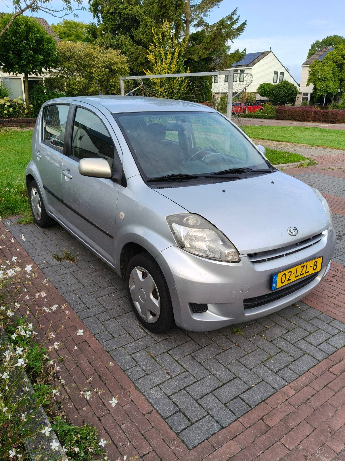 Daihatsu Sirion 1.3 AUT 2010 Grijs APK, Stof, Zwart, 4 cilinders, 1000 kg