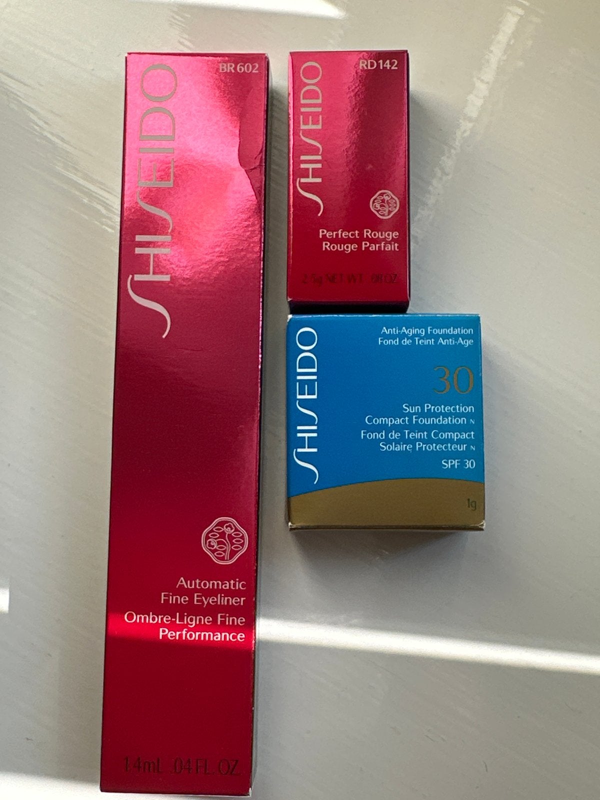 Shiseido Make-up Set: Eyeliner, Lippenstift & Foundation, Lippen, Bruin, Nieuw, Ophalen of Verzenden