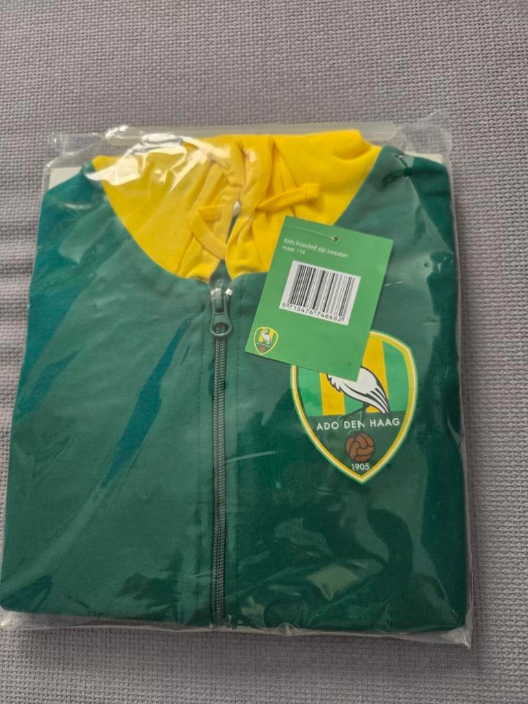 ADO Den Haag hooded zip sweater. Maat 116 Nieuw, Ophalen, Nieuw, ADO Den Haag, Jongen of Meisje