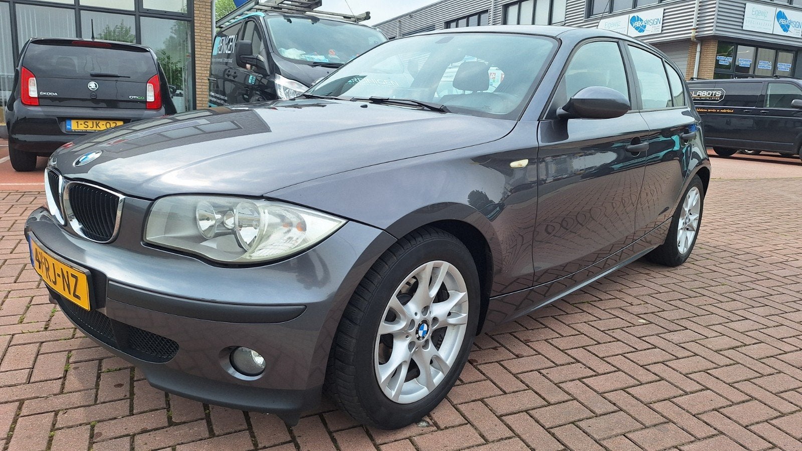 BMW 1-Serie 1.6 116I 2005 Grijs, Auto's, BMW, 1596 cc, 4 cilinders, 635 kg, Origineel Nederlands