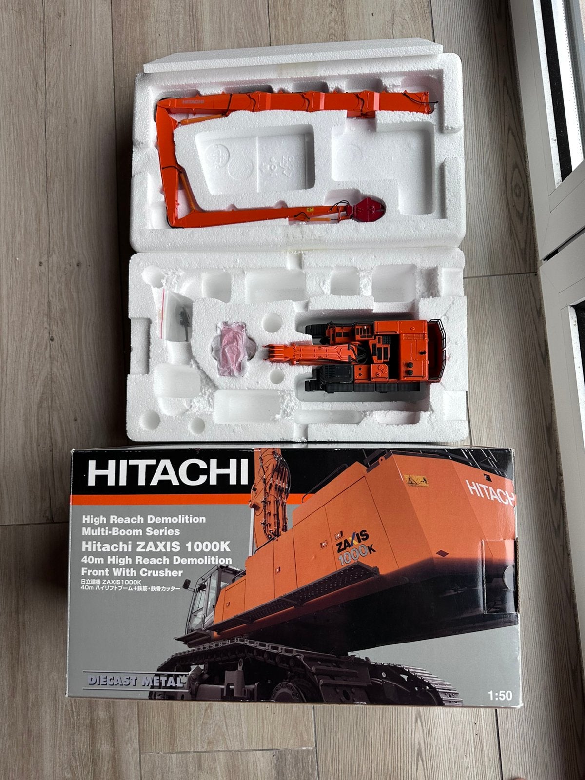 NZG hitachi 1000K Zaxis 40 meter, Hobby en Vrije tijd, Modelauto's | 1:50, Ophalen of Verzenden, Zo goed als nieuw, Hijskraan, Tractor of Landbouw