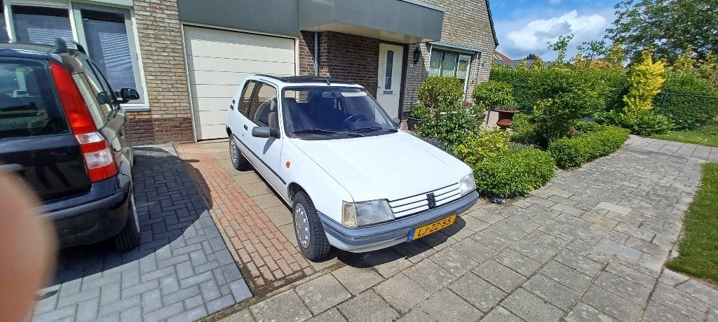 Peugeot 205 1.6 AUT 1995 Wit, Auto's, Peugeot, Stof, Wit, Origineel Nederlands, Particulier