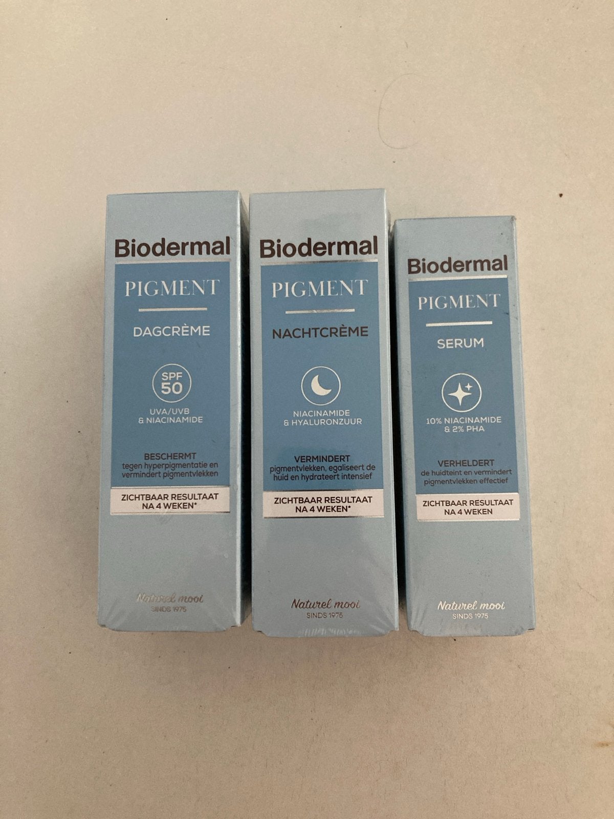 Biodermal Pigment Dagcrème, Nachtcrème & Serum Set, Sieraden, Tassen en Uiterlijk, Ophalen of Verzenden, Nieuw, Gehele gezicht