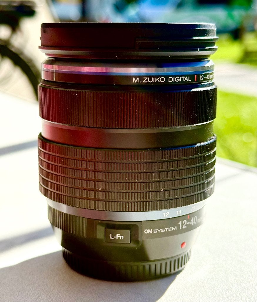 OM SYSTEM M.Zuiko 12-40mm ruilen tegen M.Zuiko 8-25mm, Audio, Tv en Foto, Ophalen, Zo goed als nieuw, 12 mm, Zonnekap