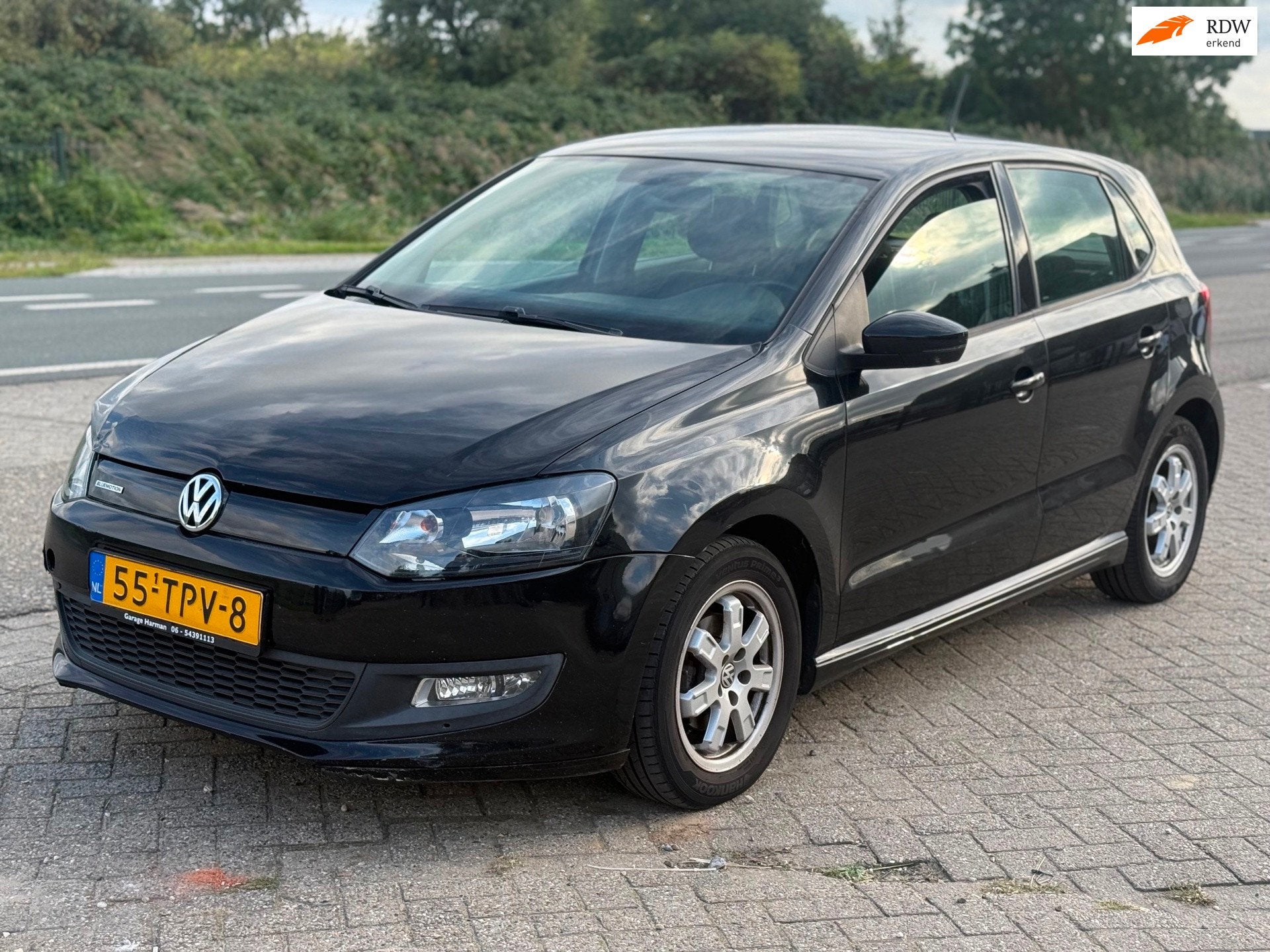 Volkswagen Polo 1.2 TDI BlueMotion Bj 2012 Zwart 5Drs Airco, Voorwielaandrijving, Stof, Gebruikt, 96 €/maand