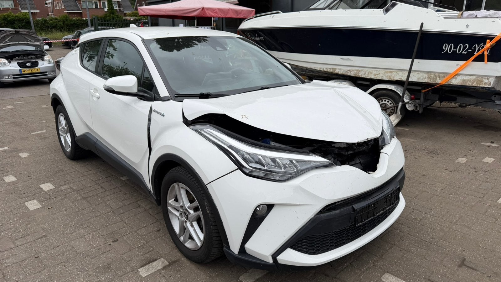 Toyota C-HR 1.8 Hybrid 122pk CVT 2022 Wit schadeauto, Auto's, Lichtsensor, Stof, 725 kg, 4 cilinders