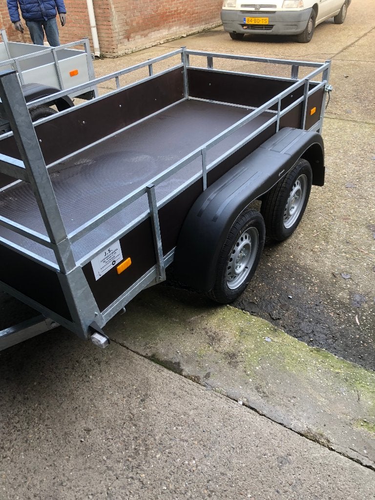 nieuwe dubbelas aannemersuitvoering 2.57.m x 1.31. ongeremd., Ophalen, Nieuw