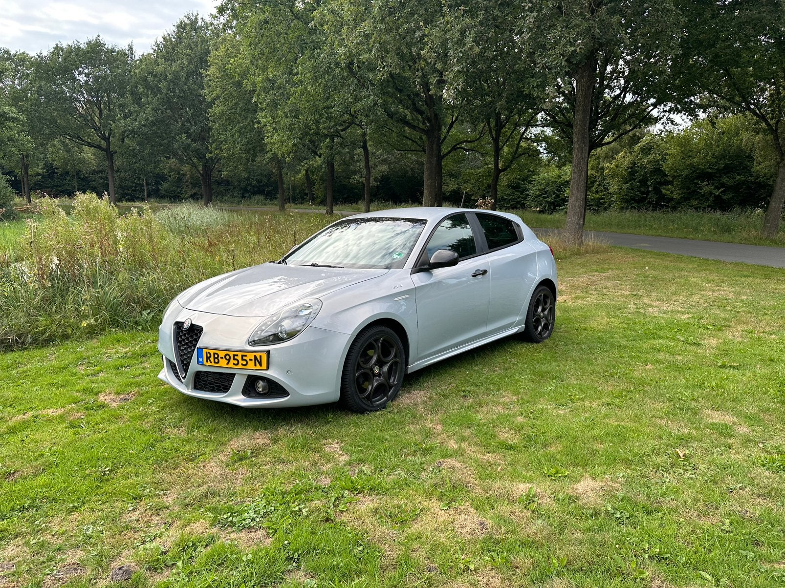 Alfa Romeo Giulietta 1.6 Jtdm Sprint 2015, Auto's, Alfa Romeo, Voorwielaandrijving, Euro 5, Zwart, Alcantara