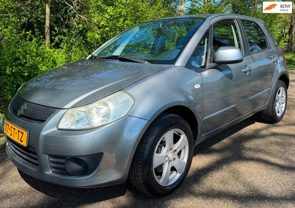 Suzuki SX4 1.6 Comfort 2006 AIRCO NAP NIEUWE APK, Auto's, Voorwielaandrijving, Gebruikt, Zwart, 4 cilinders
