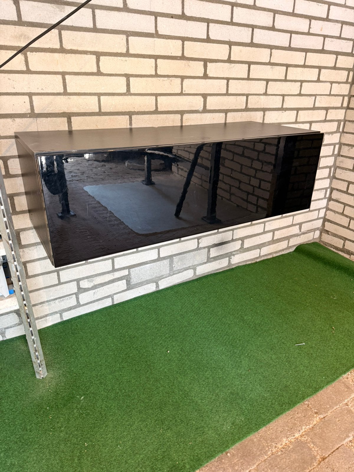 Zwevend tv-meubel / wandkast hoogglans zwart, Ophalen, Gebruikt
