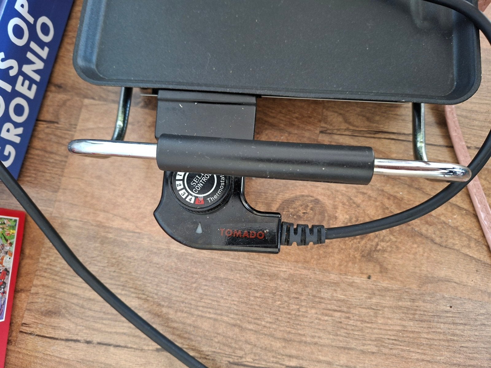 Tomado Tafelgrill / bakplaat, Ophalen