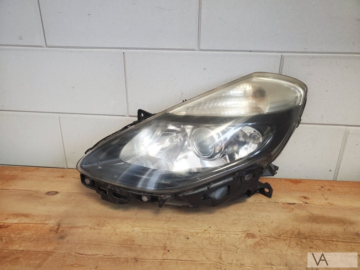 Renault Clio 3 facelift koplamp links 2009 - 2013 beetje dof, Gebruikt, -, Renault, -