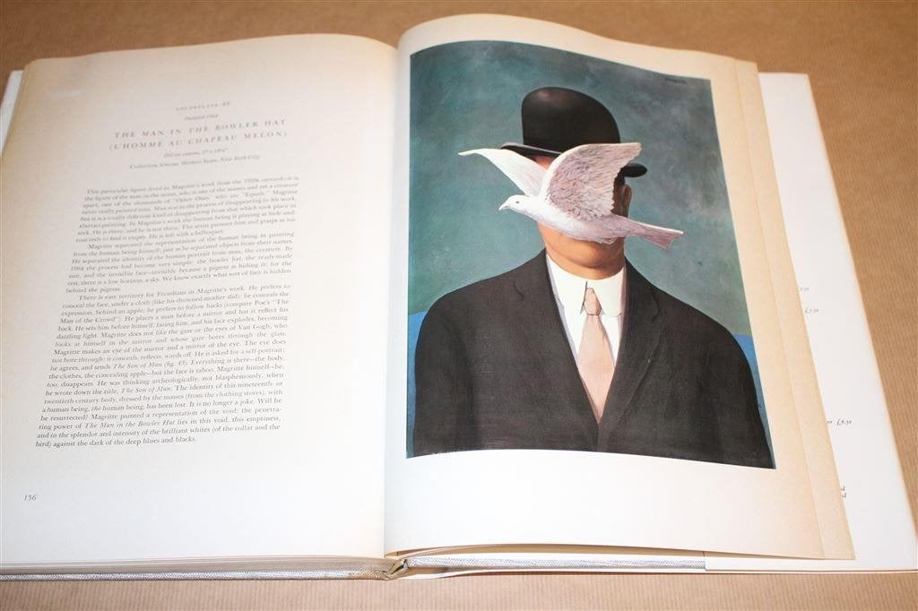 Prachtig boek over de werken van Magritte., Ophalen of Verzenden, Gelezen