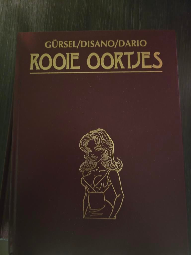Rooie Oortjes - Gürsel/Disano/Dario, Eén stripboek, Ophalen of Verzenden, Zo goed als nieuw, Gürsel, Disano, Dario