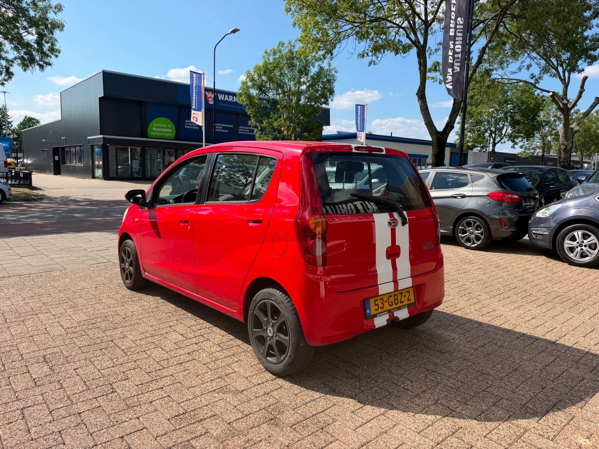 Daihatsu Cuore 1.0 Premium, Voorwielaandrijving, Stof, Zwart, 18 €/maand