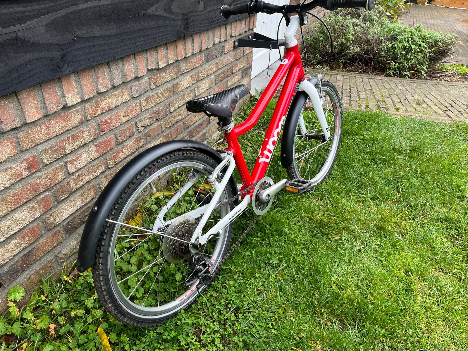 Woom 4 kinderfiets, Ophalen, Gebruikt, Velgrem, 20 inch of meer