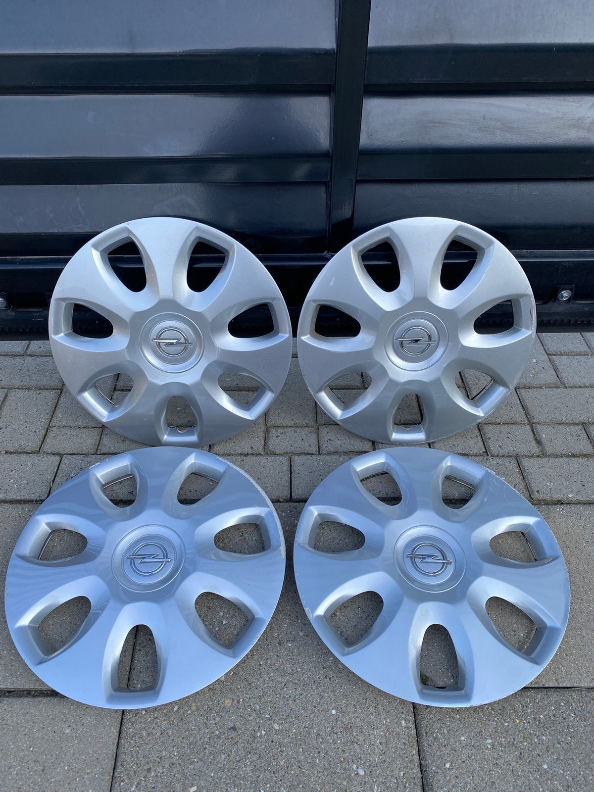 Set originele Opel Corsa D wieldoppen 15” inch, Ophalen of Verzenden, Gebruikt
