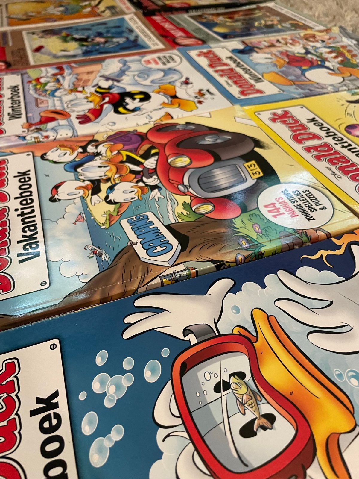 Diverse vakantie boeken waaronder Donald Duck, Boeken, Meerdere stripboeken, Ophalen, Zo goed als nieuw