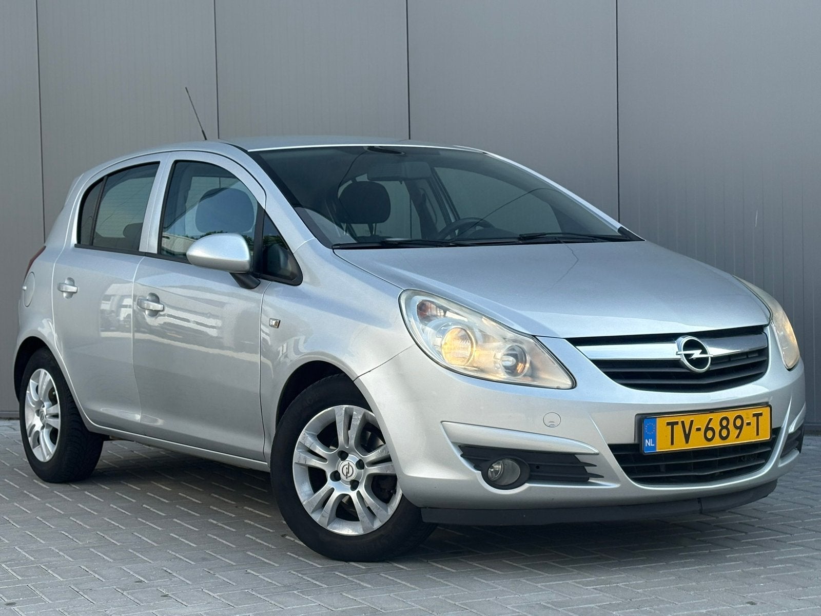 Opel Corsa 1.2 16V 5D Easytronic 2010 Grijs, Auto's, 4 cilinders, 1229 cc, 49 €/maand, Particulier